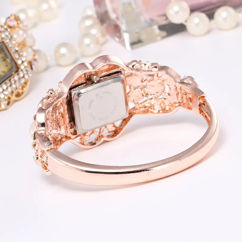Pearl and Diamond Women's Hollow Bangle Watch